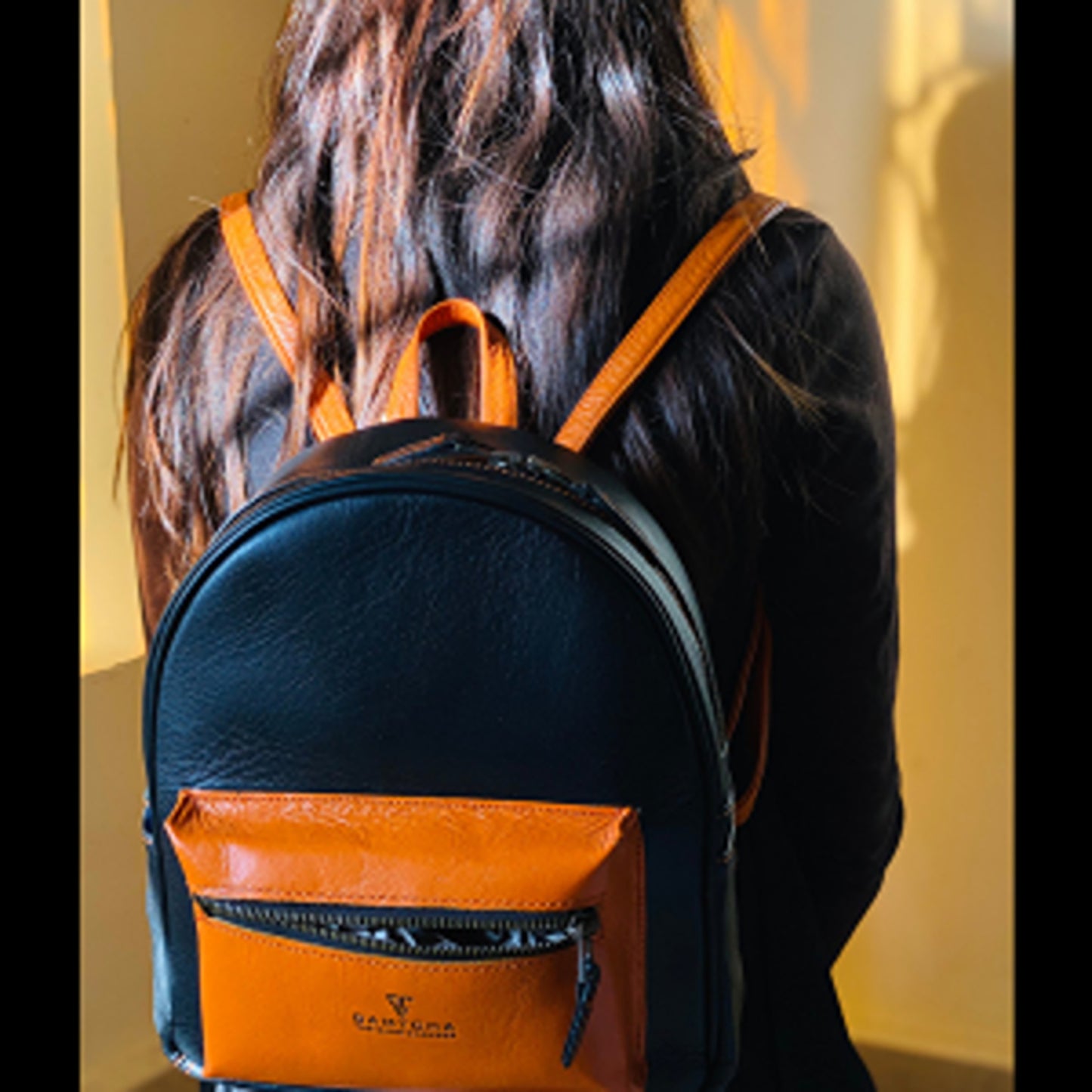 The leather Mini backpack handbag size